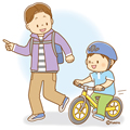 ランニングバイクに乗る男の子とお父さん